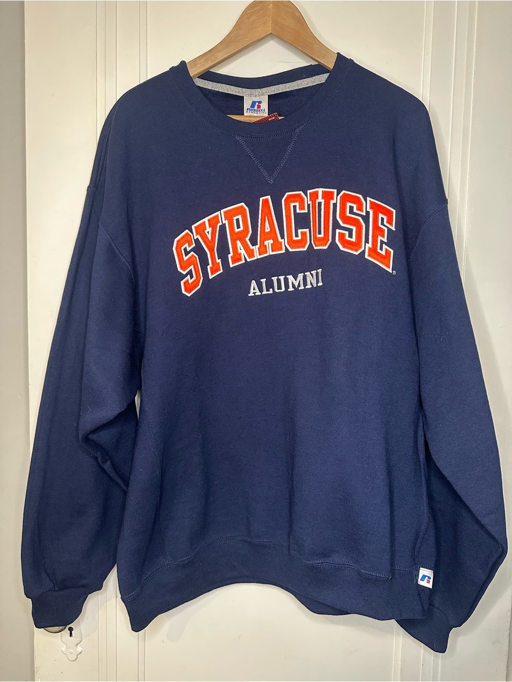 Syracuse alumni Russell Athletic Navy Crewneck with Orange Syracuse Embroidery
